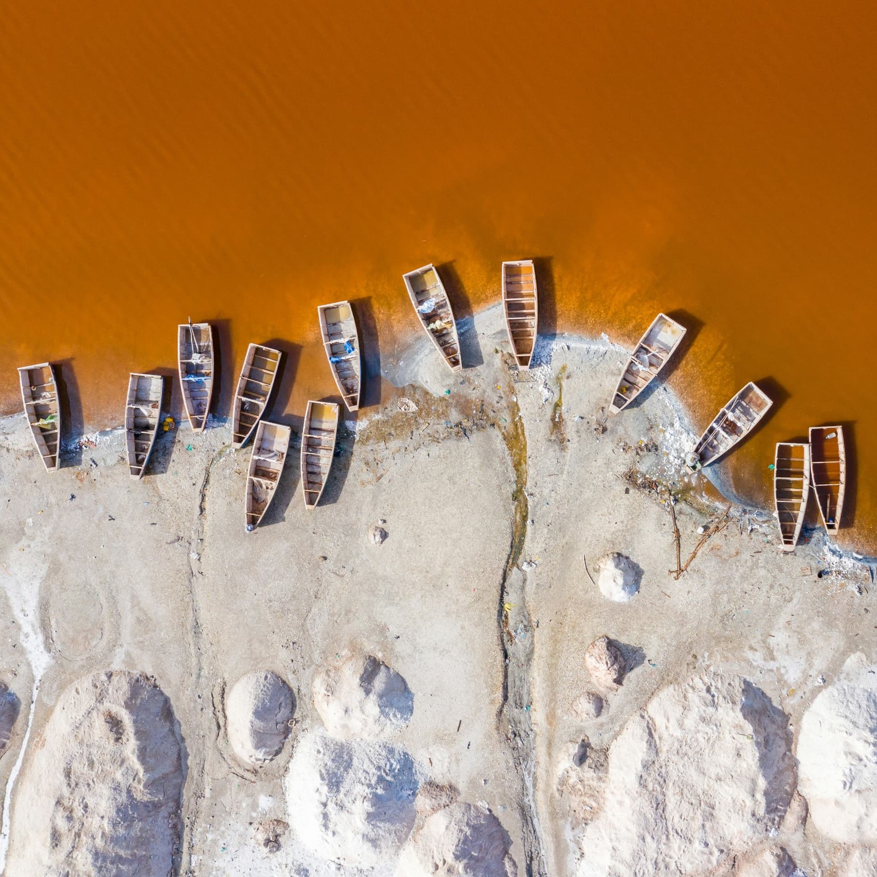 Fishing boats along an African lakeshore, viewed from above